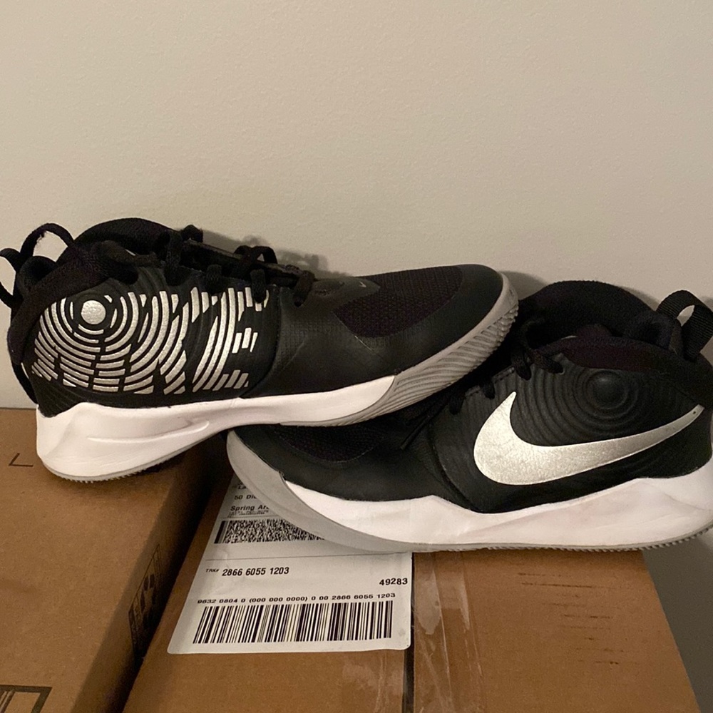 Youth Nike basketball shoes. Worn indoors only